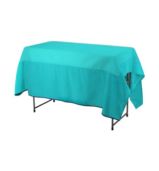 A rectangular table covered with a turquoise tablecloth, constructed with a metal frame visible at the bottom.