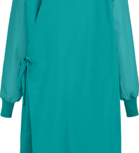 Long-sleeved green Lac-Mac, Limited Surgical Gown, Level 4, Full Barrier to Hem, Tie Closure, Knit Neckband, 5XH with a tie closure at the waist and a small barcode label near the neckline, viewed from the back. This AAMI PB70 Standard compliant gown also features a liquid-proof barrier for optimal protection.