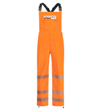 A pair of Lac-Mac, Limited Overall, High-Visibility, FR/ARC Rated, SAFE-T™ Style, Reflective Markings, Regular, 706FE with reflective bands on the legs and black straps, made from GORE-TEX PYRAD fabric, featuring pockets and patches above the chest.